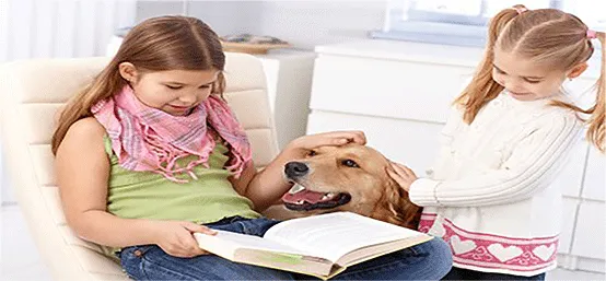 photo of kids reading with dog